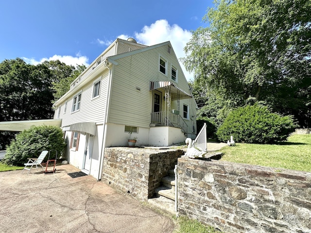 175 Coram Rd, Shelton, CT 06484 - view of front of home featuring a patio and a front yard
