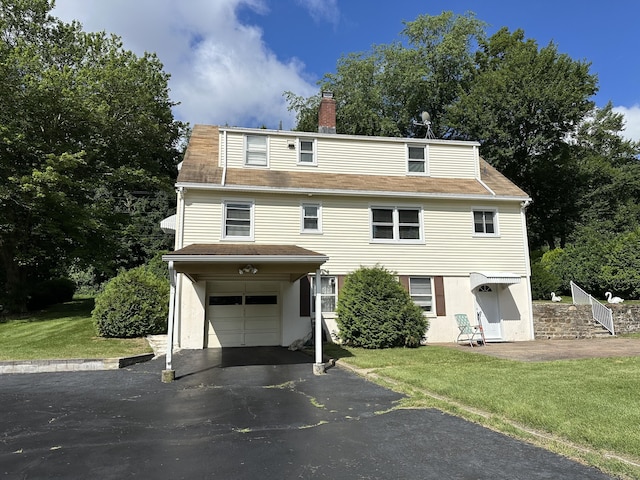175 Coram Rd, Shelton, CT 06484 - view of front of house with an attached garage, a front yard, a chimney, asphalt driveway, and stucco siding