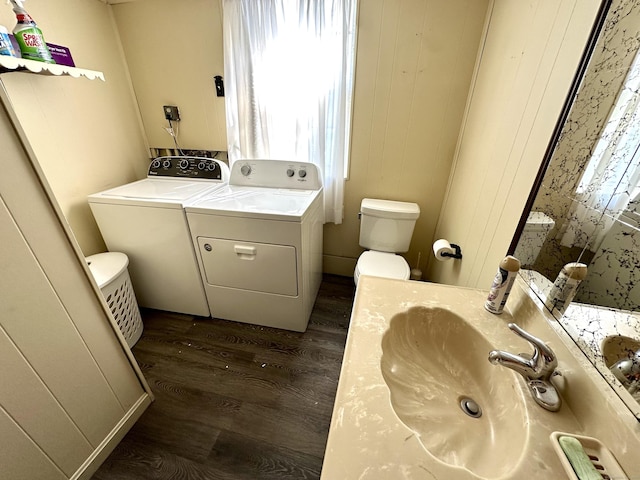 175 Coram Rd, Shelton, CT 06484 - half bath featuring washing machine and clothes dryer, wood finished floors, and vanity