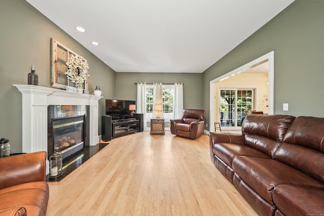 118 Cobblestone Dr, Southington, CT 06479 - living area featuring wood finished floors, a premium fireplace, and recessed lighting