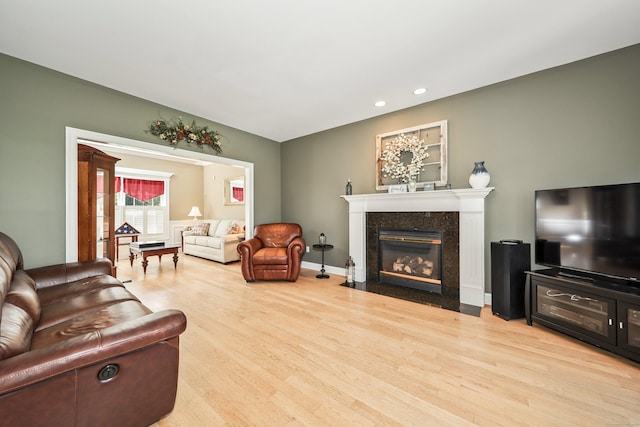 118 Cobblestone Dr, Southington, CT 06479 - living room with wood finished floors, a fireplace, and recessed lighting