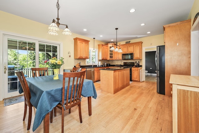 118 Cobblestone Dr, Southington, CT 06479 - dining space with light wood-type flooring and recessed lighting