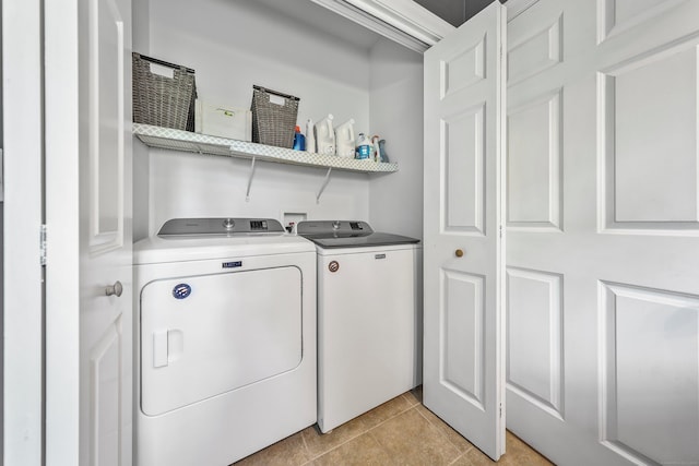 118 Cobblestone Dr, Southington, CT 06479 - laundry area with washing machine and clothes dryer and light tile patterned flooring