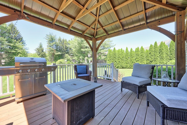 118 Cobblestone Dr, Southington, CT 06479 - wooden deck with area for grilling and a gazebo