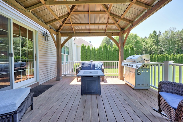 118 Cobblestone Dr, Southington, CT 06479 - wooden deck featuring a gazebo, a grill, and an outdoor fire pit