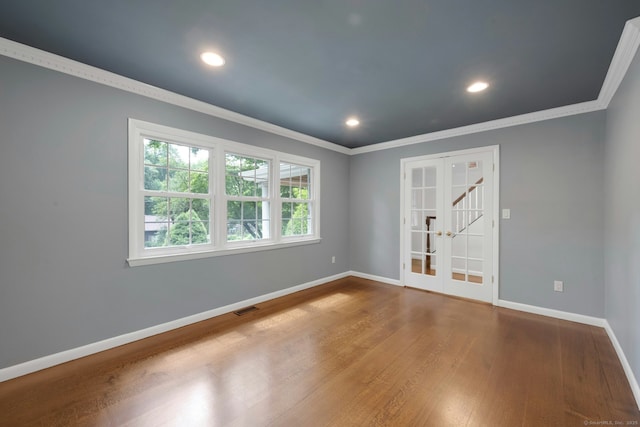 46 Bowman Dr, Greenwich, CT 06831 - empty room featuring french doors, crown molding, wood finished floors, and recessed lighting