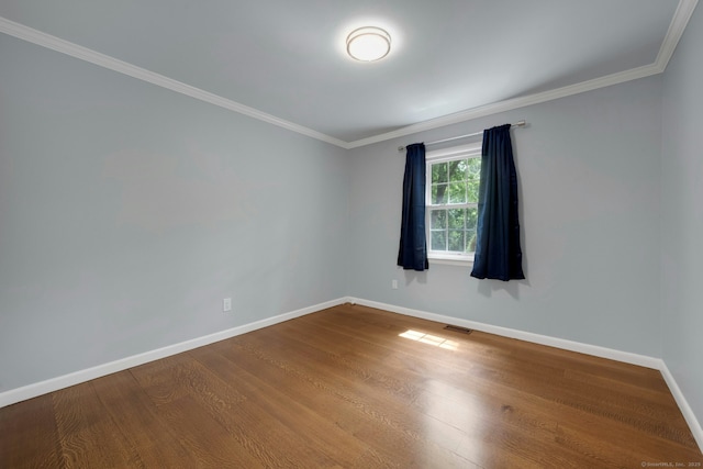 46 Bowman Dr, Greenwich, CT 06831 - unfurnished room with wood finished floors and crown molding