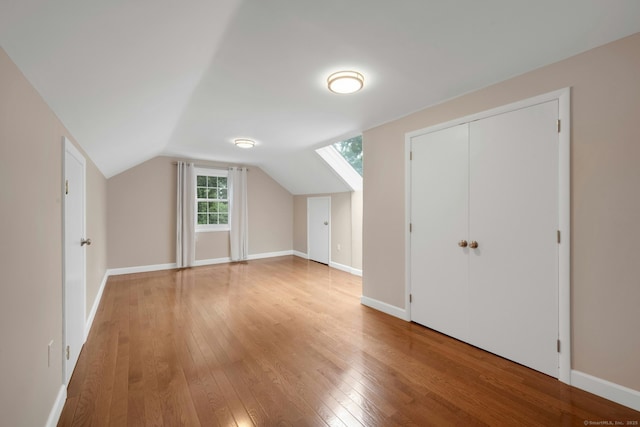 46 Bowman Dr, Greenwich, CT 06831 - bonus room featuring light wood-style flooring and vaulted ceiling