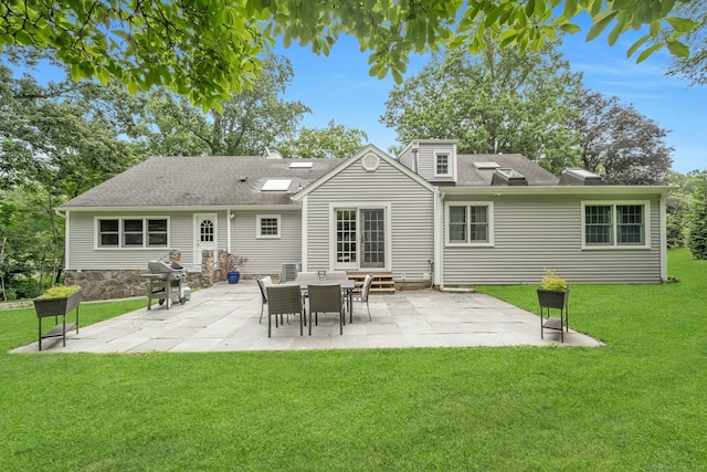 46 Bowman Dr, Greenwich, CT 06831 - rear view of property featuring a yard, entry steps, and a patio area