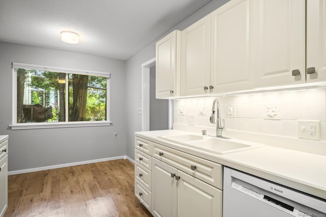 737 Heritage Vlg Unit A, Southbury, CT 06488 - kitchen featuring dishwasher, backsplash, white cabinets, and light wood-type flooring