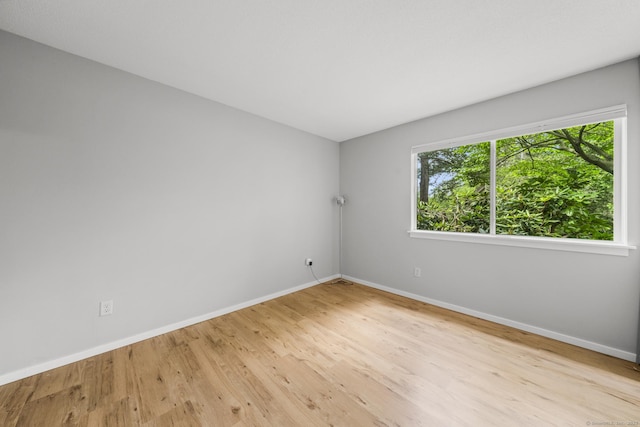 737 Heritage Vlg Unit A, Southbury, CT 06488 - spare room with baseboards and wood finished floors