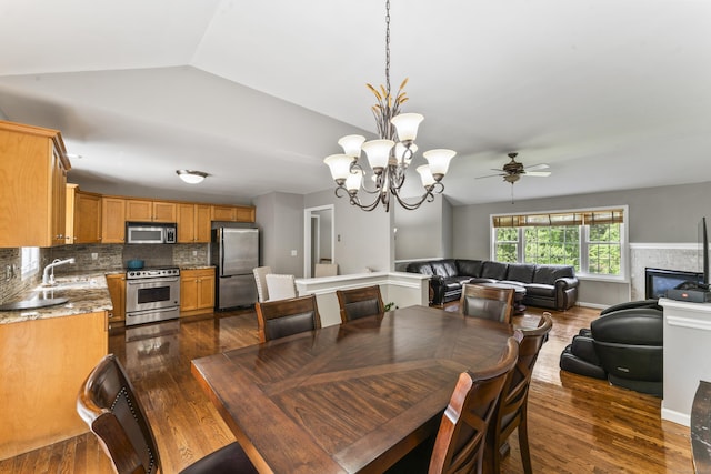 24 Ken Oaks Dr, Danbury, CT 06810 - dining space with ceiling fan, dark wood-style flooring, a chandelier, and vaulted ceiling