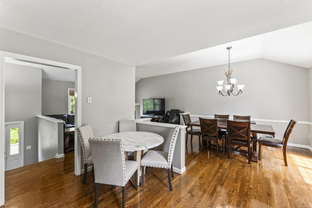24 Ken Oaks Dr, Danbury, CT 06810 - dining area with wood finished floors, a chandelier, and vaulted ceiling