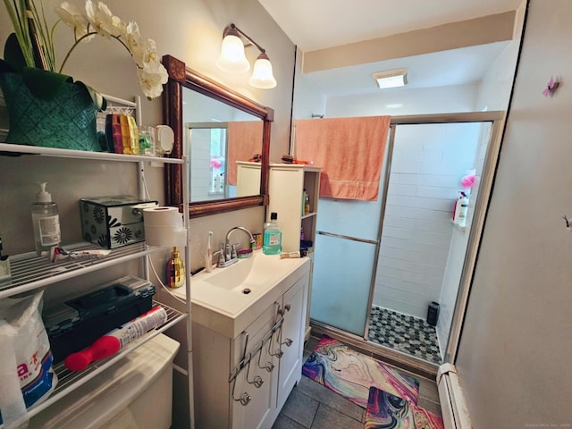 209 Maple St, East Hartford, CT 06118 - full bath featuring vanity, a stall shower, and a baseboard radiator