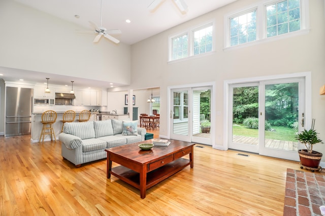 35 Vista Rd, Wilton, CT 06897 - living area featuring a high ceiling, light wood-style floors, a ceiling fan, and recessed lighting