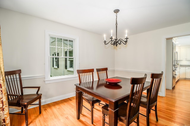 35 Vista Rd, Wilton, CT 06897 - dining space featuring a chandelier and light wood-style flooring