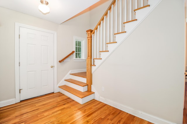 35 Vista Rd, Wilton, CT 06897 - foyer entrance with stairs, light wood-style flooring, and vaulted ceiling