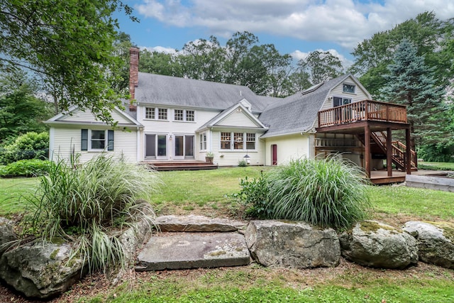 35 Vista Rd, Wilton, CT 06897 - back of house with a wooden deck, a yard, stairs, and a chimney