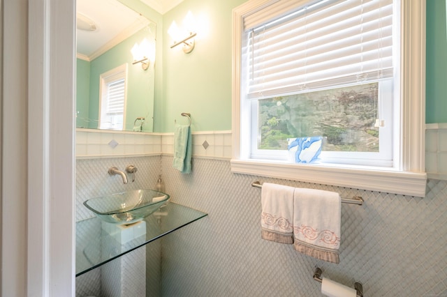 30 Partridge Rd, Stamford, CT 06903 - bathroom with wainscoting, crown molding, and tile walls