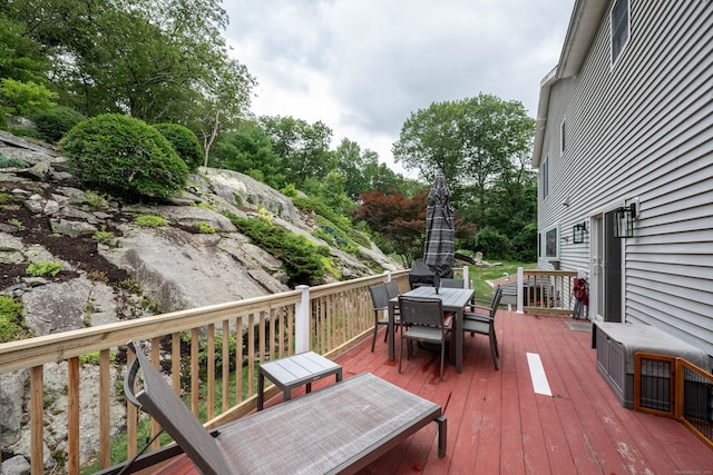 30 Partridge Rd, Stamford, CT 06903 - deck featuring outdoor dining area and view of scattered trees