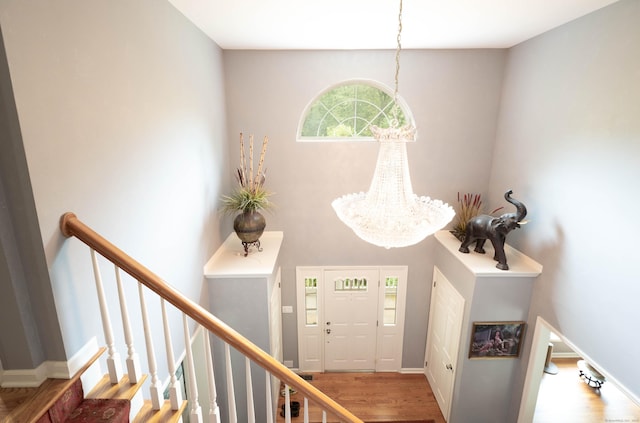 30 Partridge Rd, Stamford, CT 06903 - entrance foyer with a chandelier, wood finished floors, and a towering ceiling