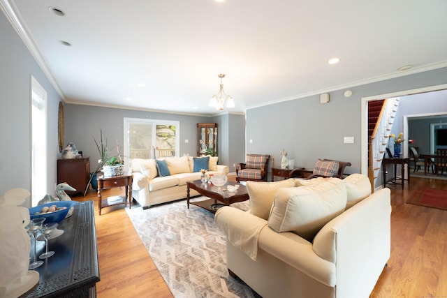 30 Partridge Rd, Stamford, CT 06903 - living room with stairway, a chandelier, light wood-type flooring, crown molding, and recessed lighting