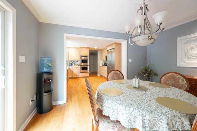 30 Partridge Rd, Stamford, CT 06903 - dining area featuring light wood-type flooring, a chandelier, and ornamental molding