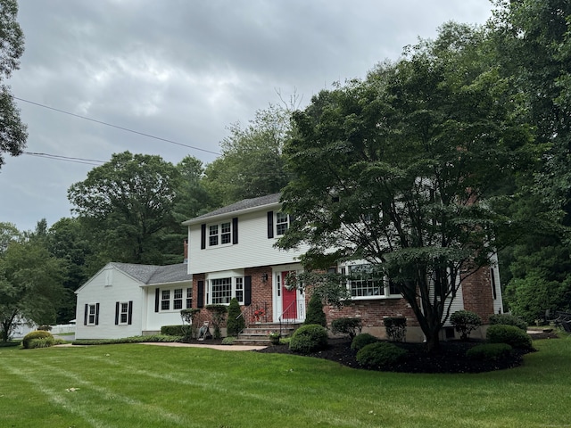 475 Riverside Dr, Cheshire, CT 06410 - view of front of home featuring brick siding and a front yard