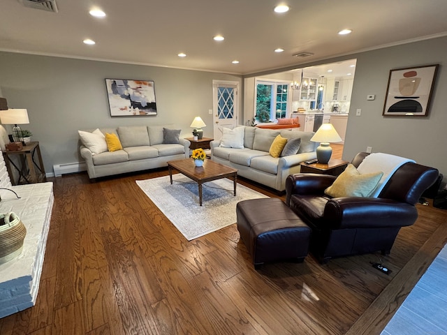 475 Riverside Dr, Cheshire, CT 06410 - living area featuring dark wood-style floors, ornamental molding, recessed lighting, a baseboard heating unit, and a chandelier