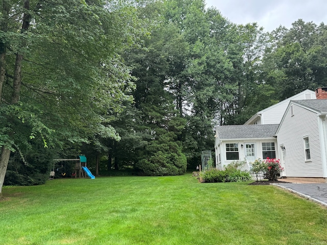 475 Riverside Dr, Cheshire, CT 06410 - view of grassy yard with a playground