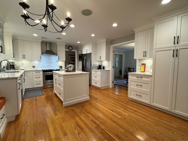 475 Riverside Dr, Cheshire, CT 06410 - kitchen with stainless steel range with electric stovetop, freestanding refrigerator, decorative backsplash, wall chimney exhaust hood, and recessed lighting