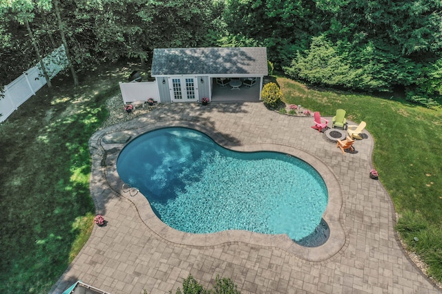 35 Walker Ln, West Hartford, CT 06117 - outdoor pool featuring a patio area, an exterior structure, an outdoor structure, and french doors