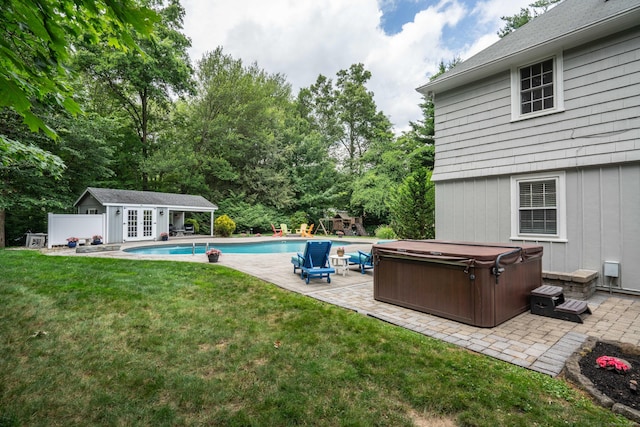 35 Walker Ln, West Hartford, CT 06117 - view of grassy yard featuring a hot tub, a patio, french doors, a storage structure, and an outdoor pool