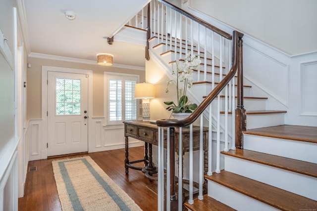 35 Walker Ln, West Hartford, CT 06117 - entryway with a decorative wall, stairway, ornamental molding, wood finished floors, and a wainscoted wall