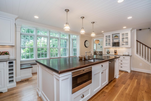 35 Walker Ln, West Hartford, CT 06117 - kitchen featuring stainless steel appliances, dark countertops, healthy amount of natural light, recessed lighting, and ornamental molding