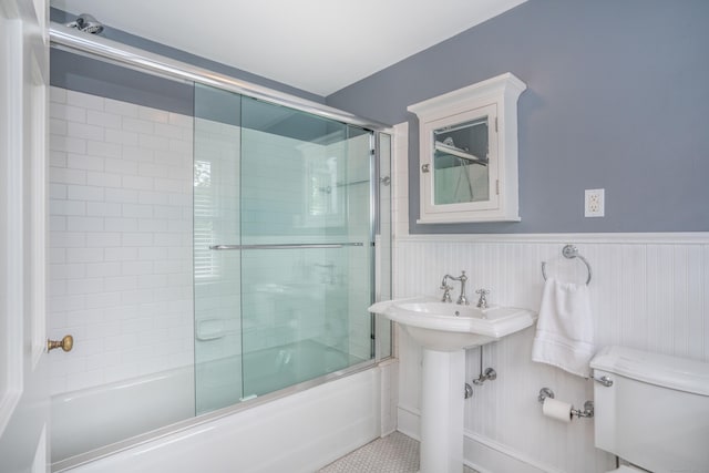 35 Walker Ln, West Hartford, CT 06117 - full bath featuring bath / shower combo with glass door and wainscoting