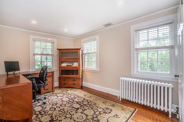 35 Walker Ln, West Hartford, CT 06117 - office area featuring radiator heating unit, plenty of natural light, light wood-style floors, ornamental molding, and recessed lighting
