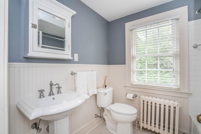 35 Walker Ln, West Hartford, CT 06117 - bathroom with radiator and a wainscoted wall