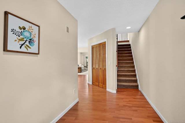 55 Wickhams Fancy Unit 55, Canton, CT 06019 - hall featuring stairway, light wood finished floors, and recessed lighting