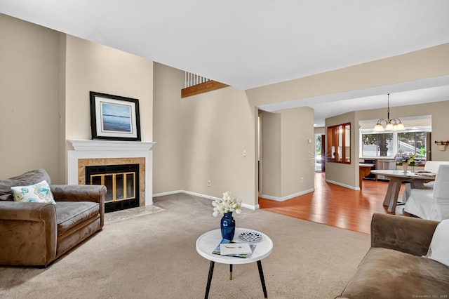55 Wickhams Fancy Unit 55, Canton, CT 06019 - living room with a chandelier, a tile fireplace, and carpet flooring