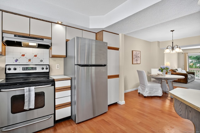 55 Wickhams Fancy Unit 55, Canton, CT 06019 - kitchen featuring stainless steel appliances, extractor fan, white cabinets, tasteful backsplash, and light wood-style floors