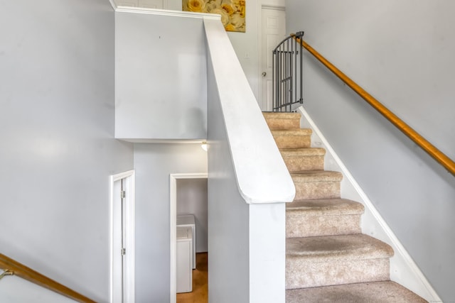 10 Leo Ln, Naugatuck, CT 06770 - stairs featuring washer / clothes dryer