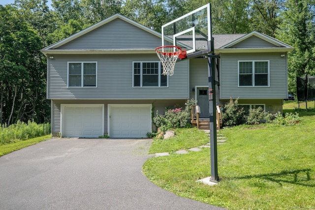 81 Lillis Rd, New Milford, CT 06776 - raised ranch with asphalt driveway, a front lawn, and an attached garage