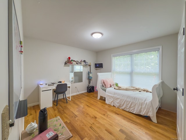 81 Lillis Rd, New Milford, CT 06776 - bedroom with light wood finished floors and a desk