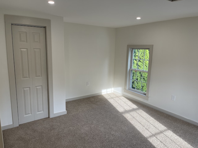 56 N Maple St, Enfield, CT 06082 - empty room with carpet flooring and recessed lighting