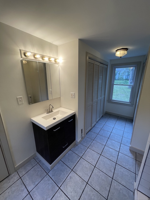 56 N Maple St, Enfield, CT 06082 - bathroom with vanity and tile patterned flooring