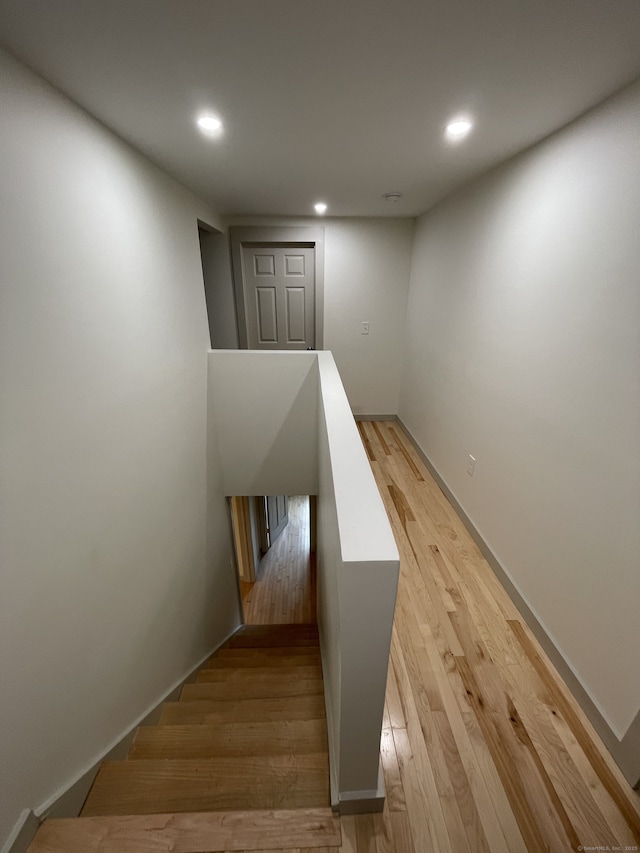 56 N Maple St, Enfield, CT 06082 - stairway with wood finished floors and recessed lighting