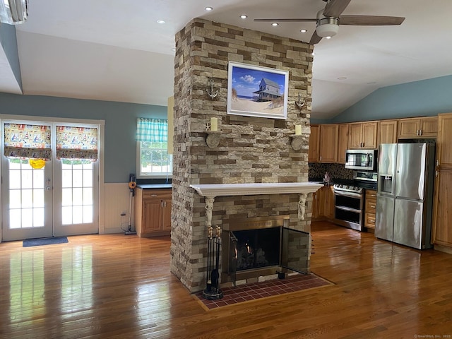18 Bch Park Rd, Clinton, CT 06413 - living area featuring a ceiling fan, hardwood / wood-style flooring, wainscoting, vaulted ceiling, and french doors
