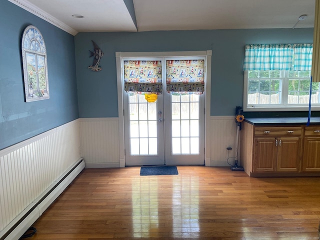 18 Bch Park Rd, Clinton, CT 06413 - doorway to outside with a baseboard heating unit, wainscoting, light wood-style flooring, and french doors