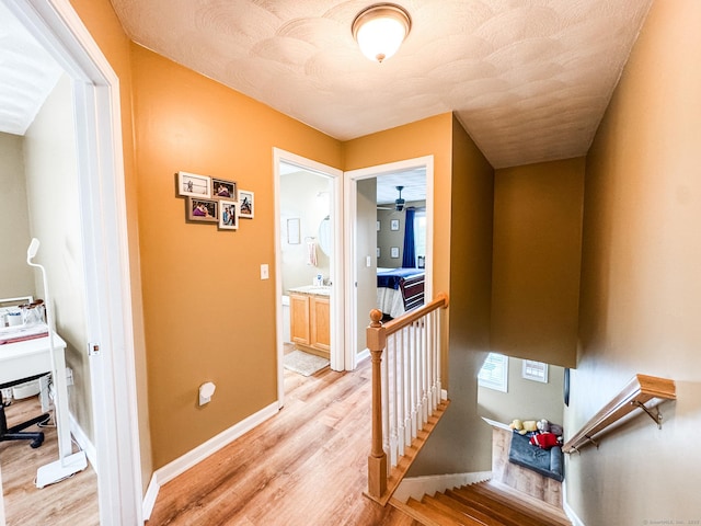 60 Sachem Dr Unit 60, Plainfield, CT 06374 - corridor with an upstairs landing and light wood-type flooring